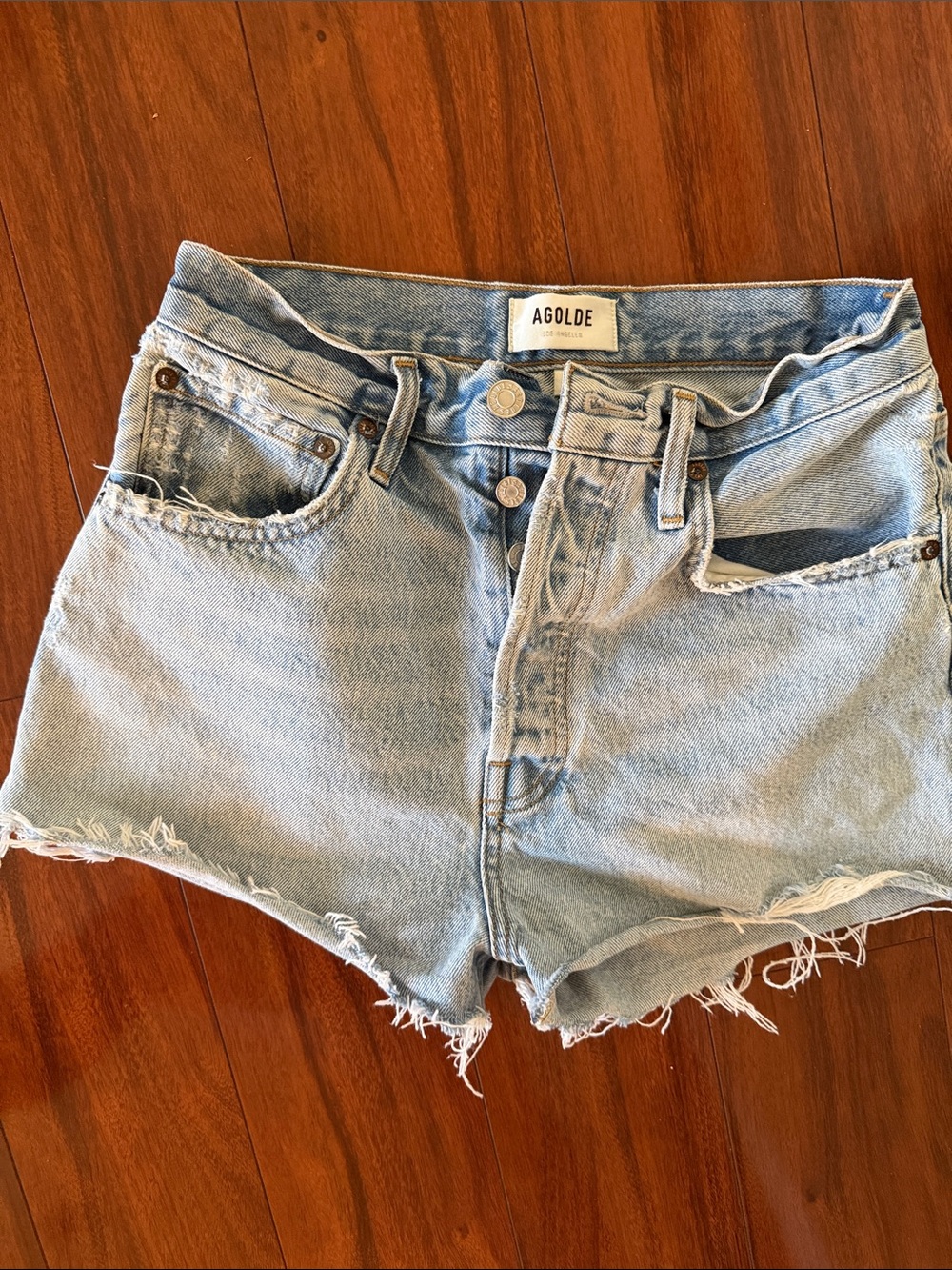 Agolde Light Wash Distressed Denim Shorts